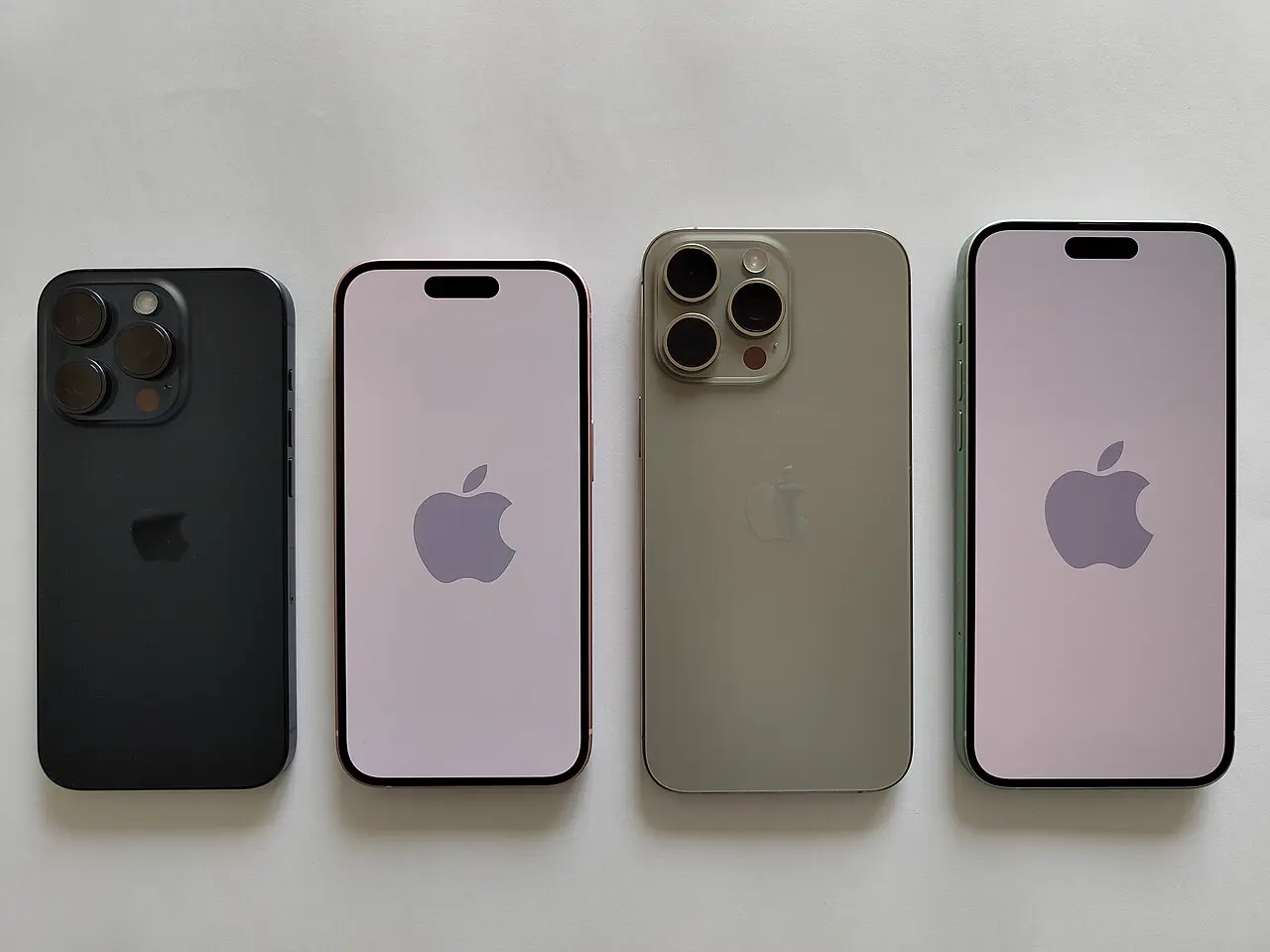 Four iPhone 15 Pro side by side