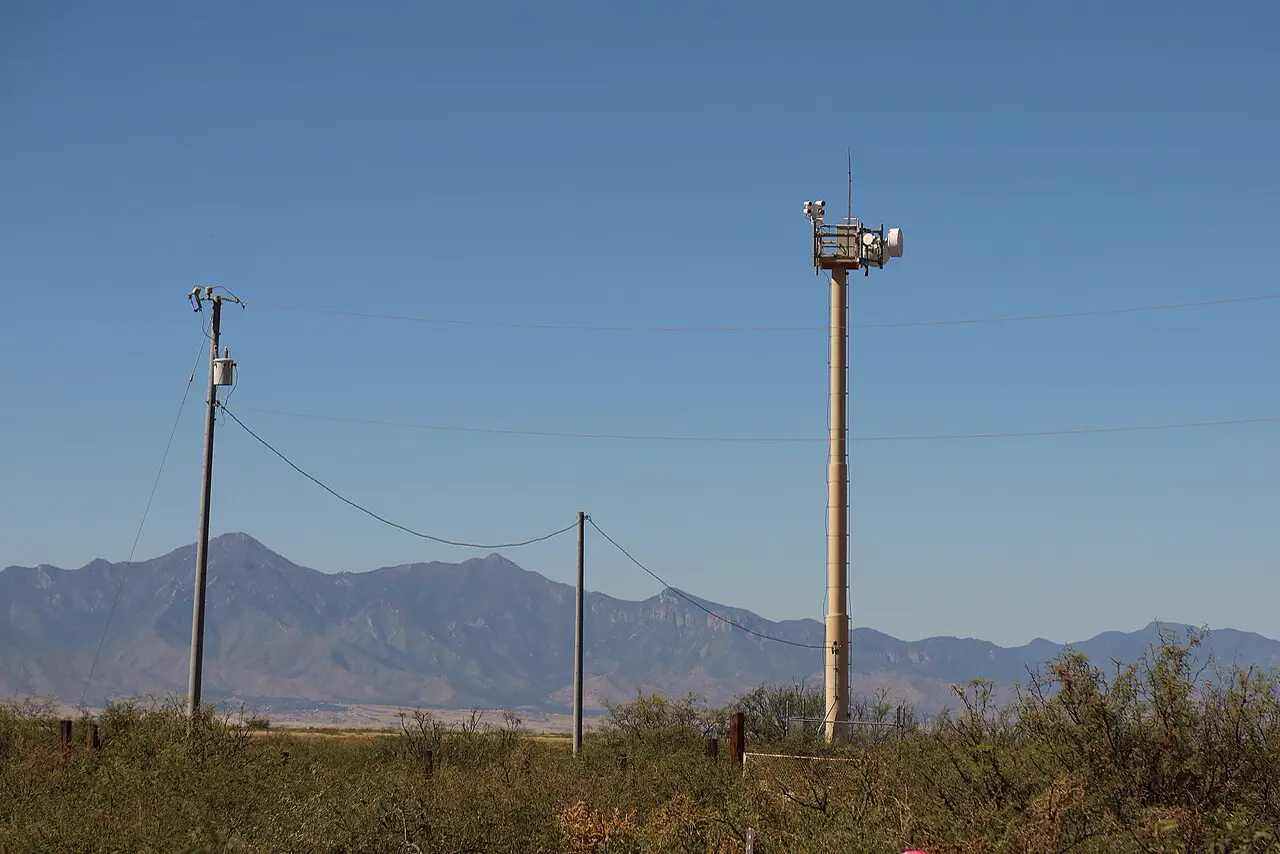 Surveillance camera tower in front of mountains in Naco, Arizona