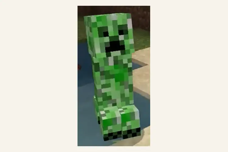 Der Creeper, eine grüne Spielfigur aus Minecraft