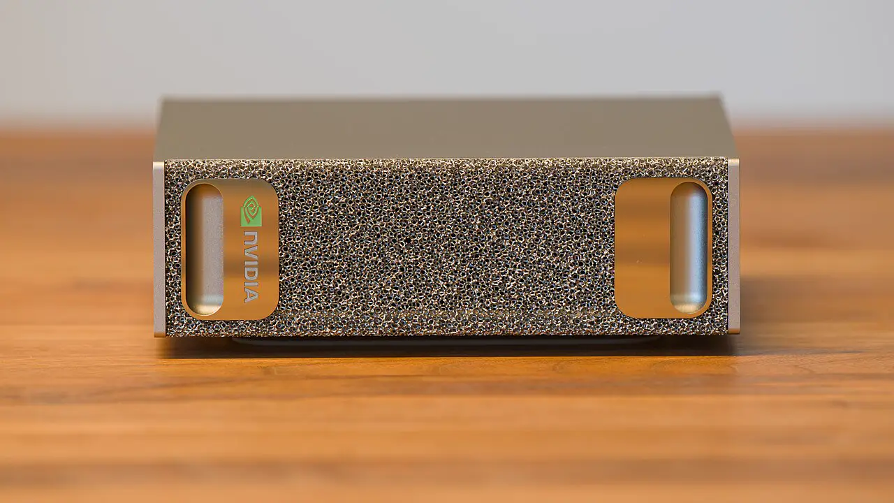 Nvidia DGX Spark compact AI computer on a wooden table